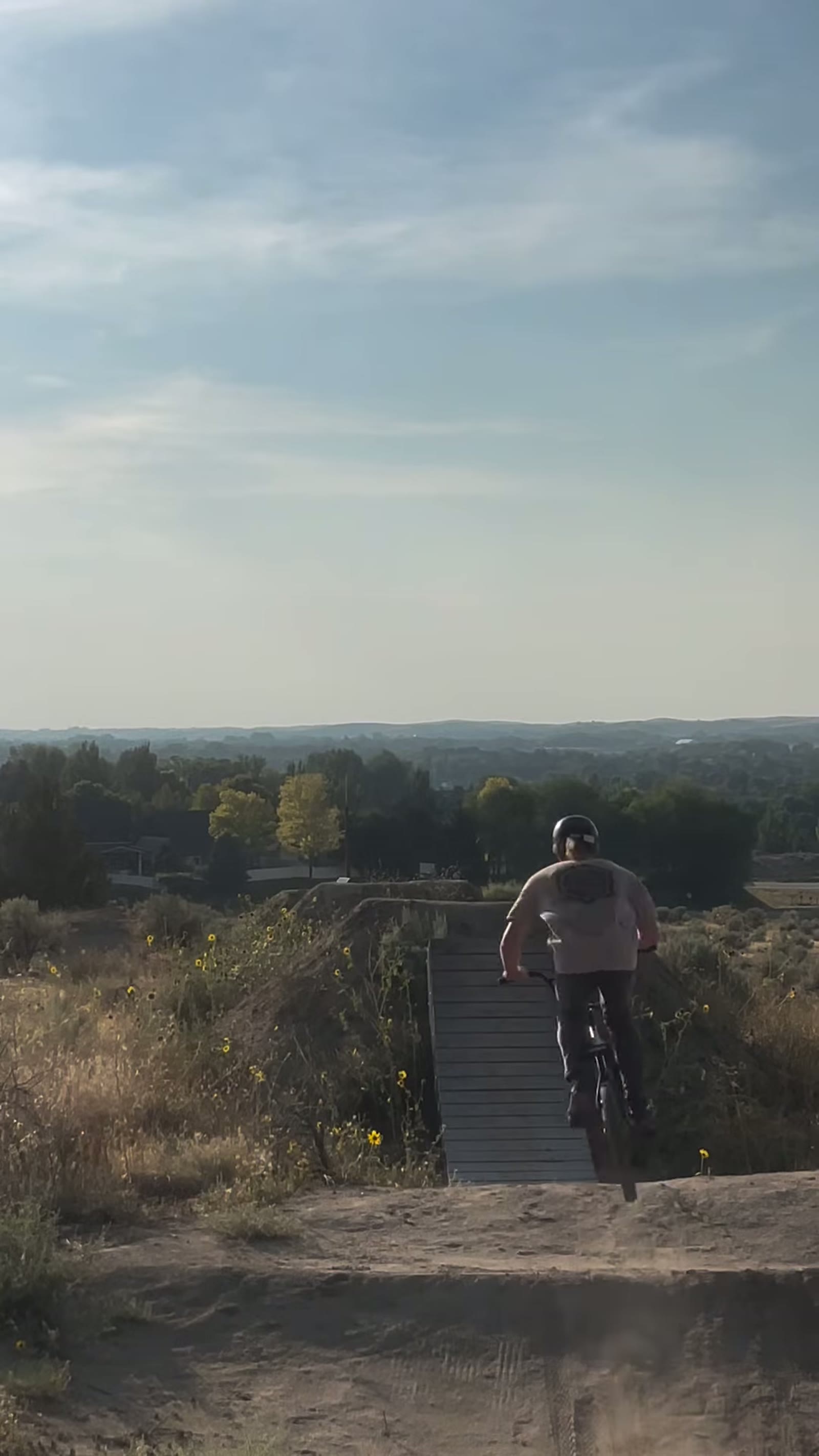 Melville Smith clearing a dirt jump at Eagle Bike Park in Eagle, Idaho